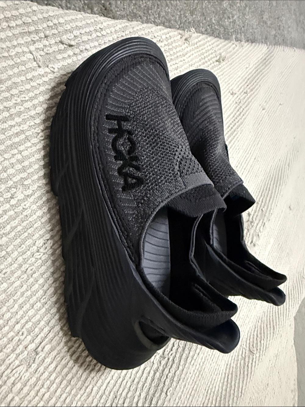 Hoka Women’s All-Black Slip-On Sneakers